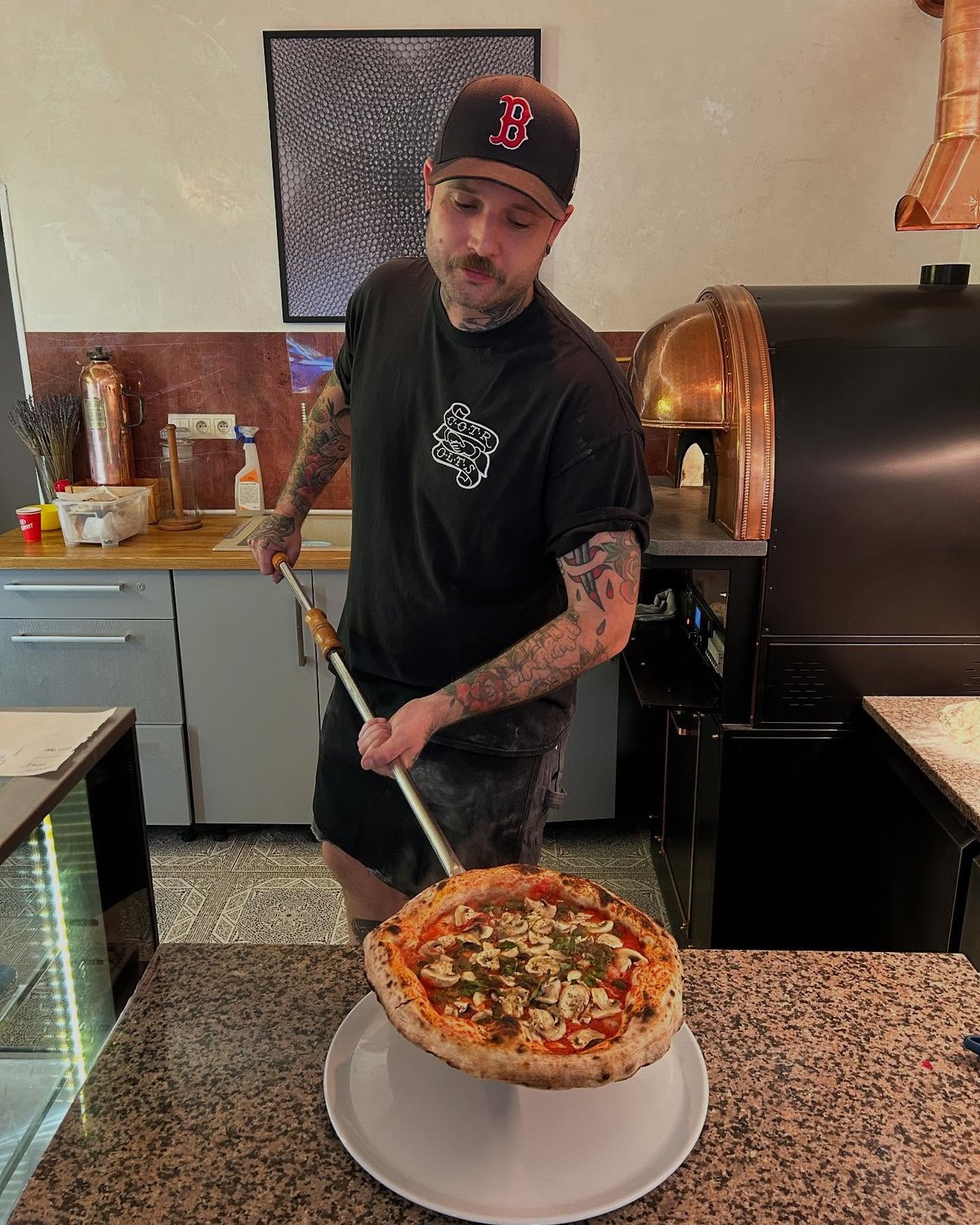 Tady dělají pizzu opravdoví mástři.