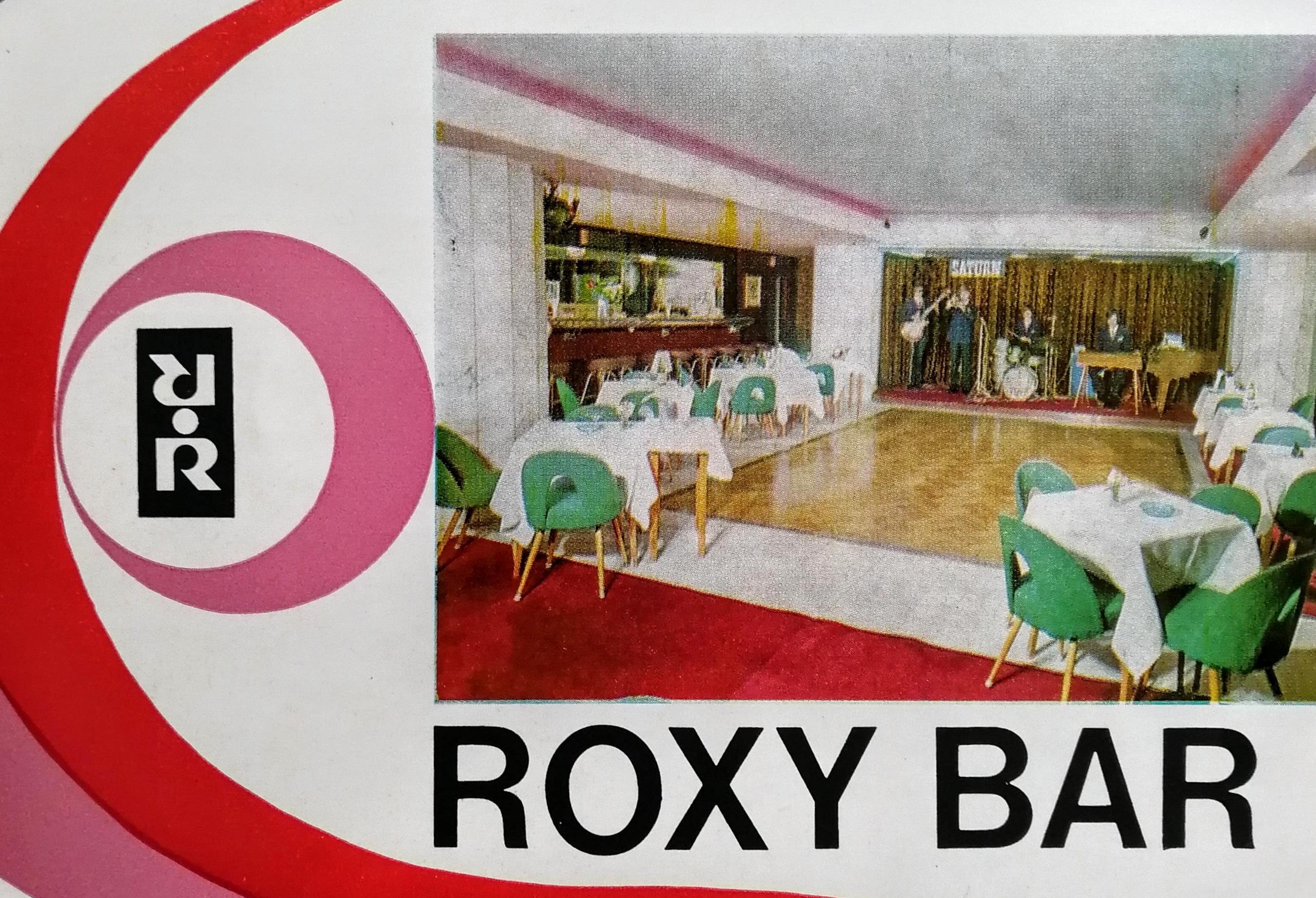 Dobová reklama na noční vinárnu Roxy